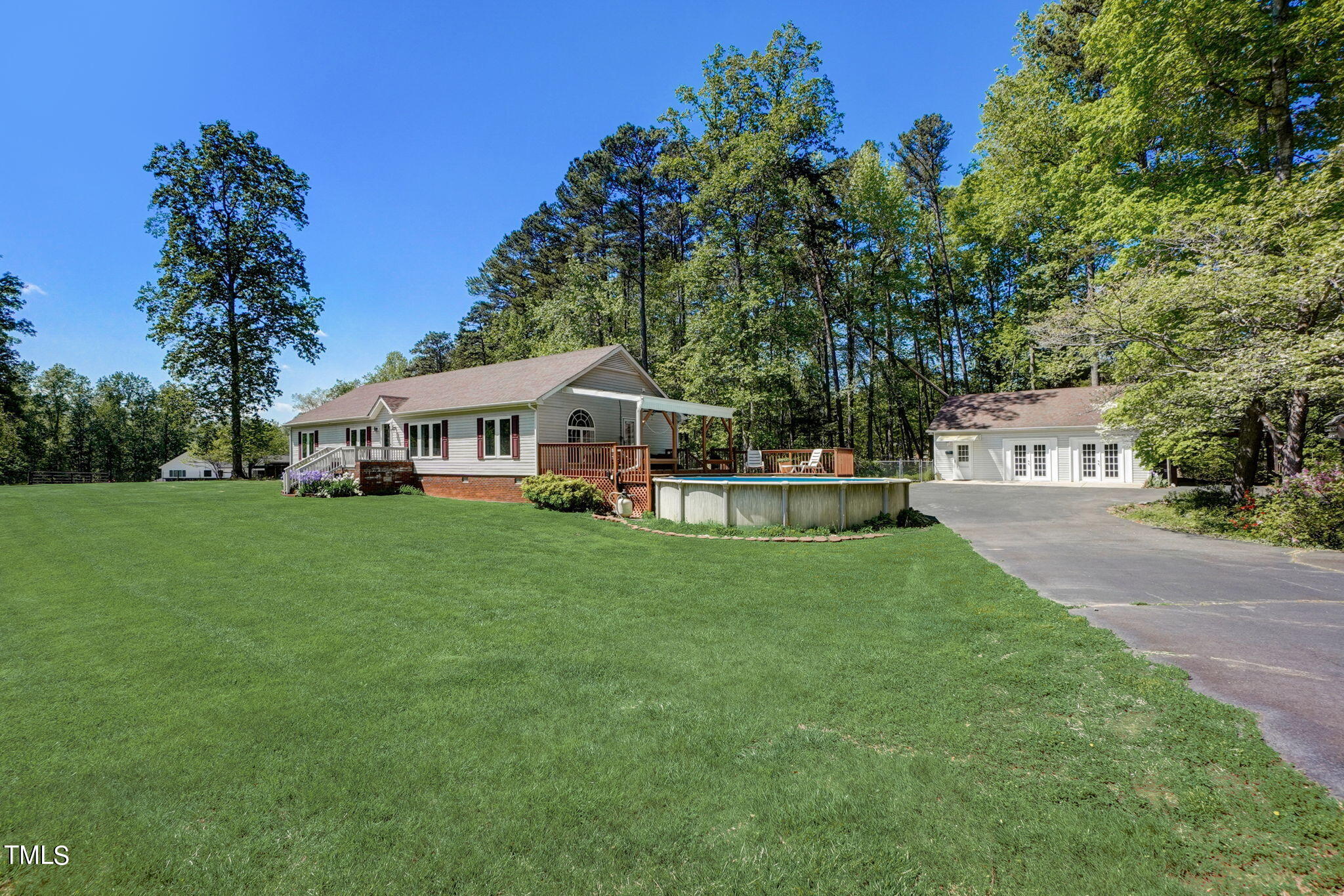 7204 New Sharon Church Road Rougemont, NC 27572 - Photo 33 of 48 a view of house with garden and trees