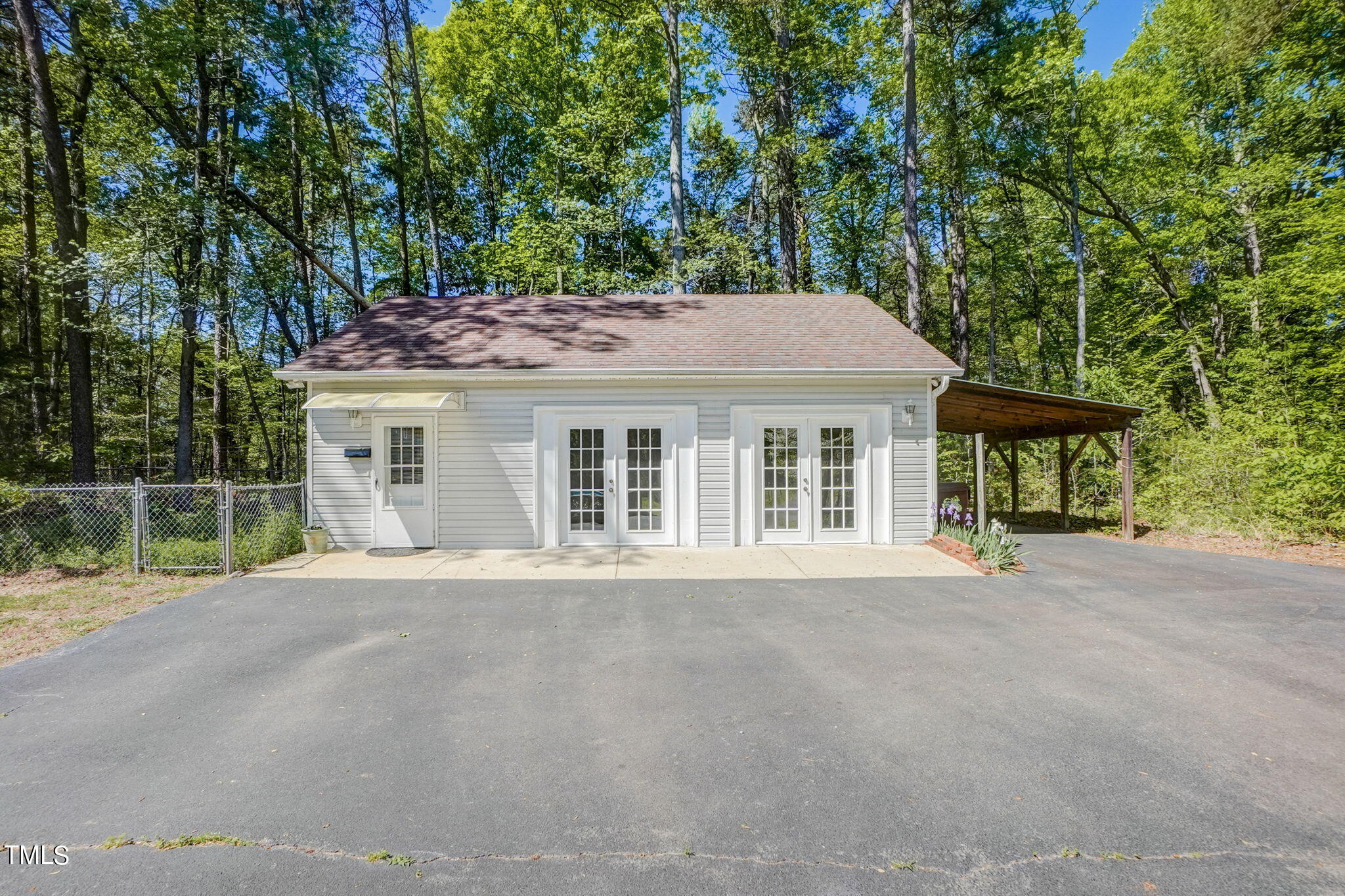 7204 New Sharon Church Road Rougemont, NC 27572 - Photo 34 of 48 a front view of a house with a garden