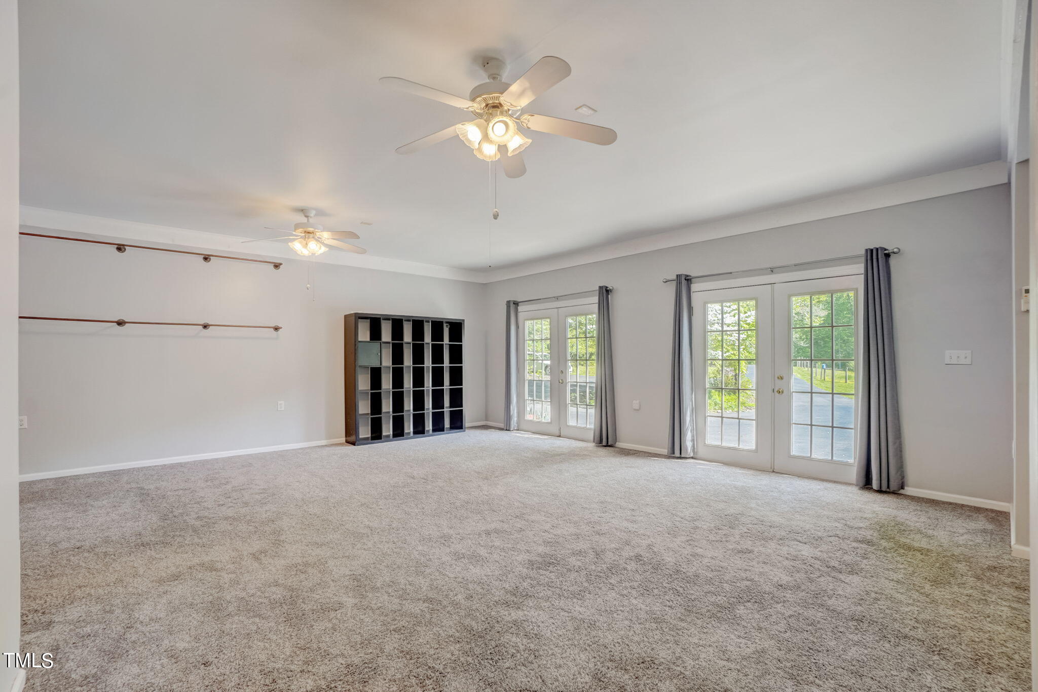 7204 New Sharon Church Road Rougemont, NC 27572 - Photo 39 of 48 a view of an empty room with chandelier fan and windows