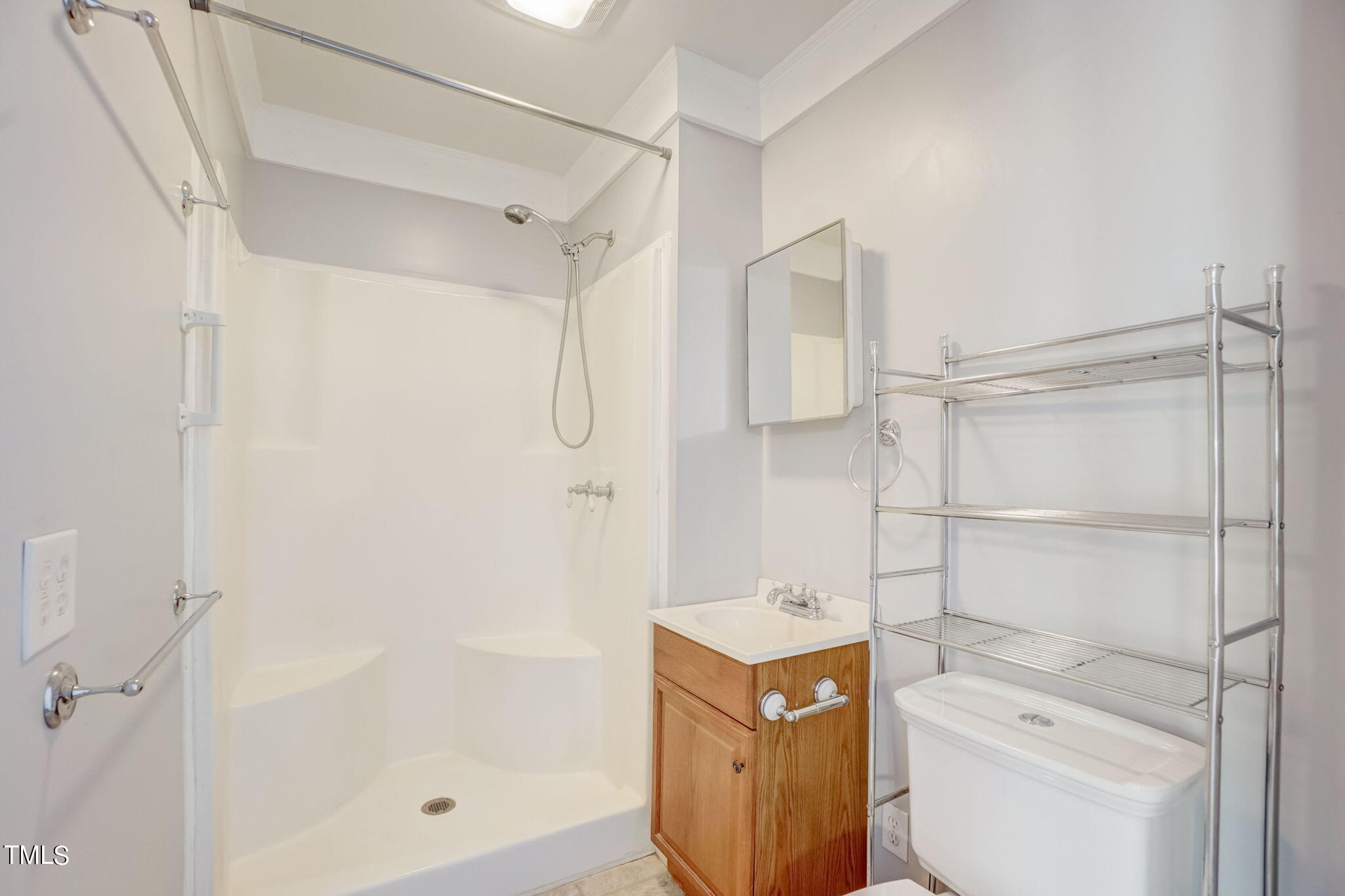 7204 New Sharon Church Road Rougemont, NC 27572 - Photo 41 of 48 a bathroom with a shower a toilet and a shower