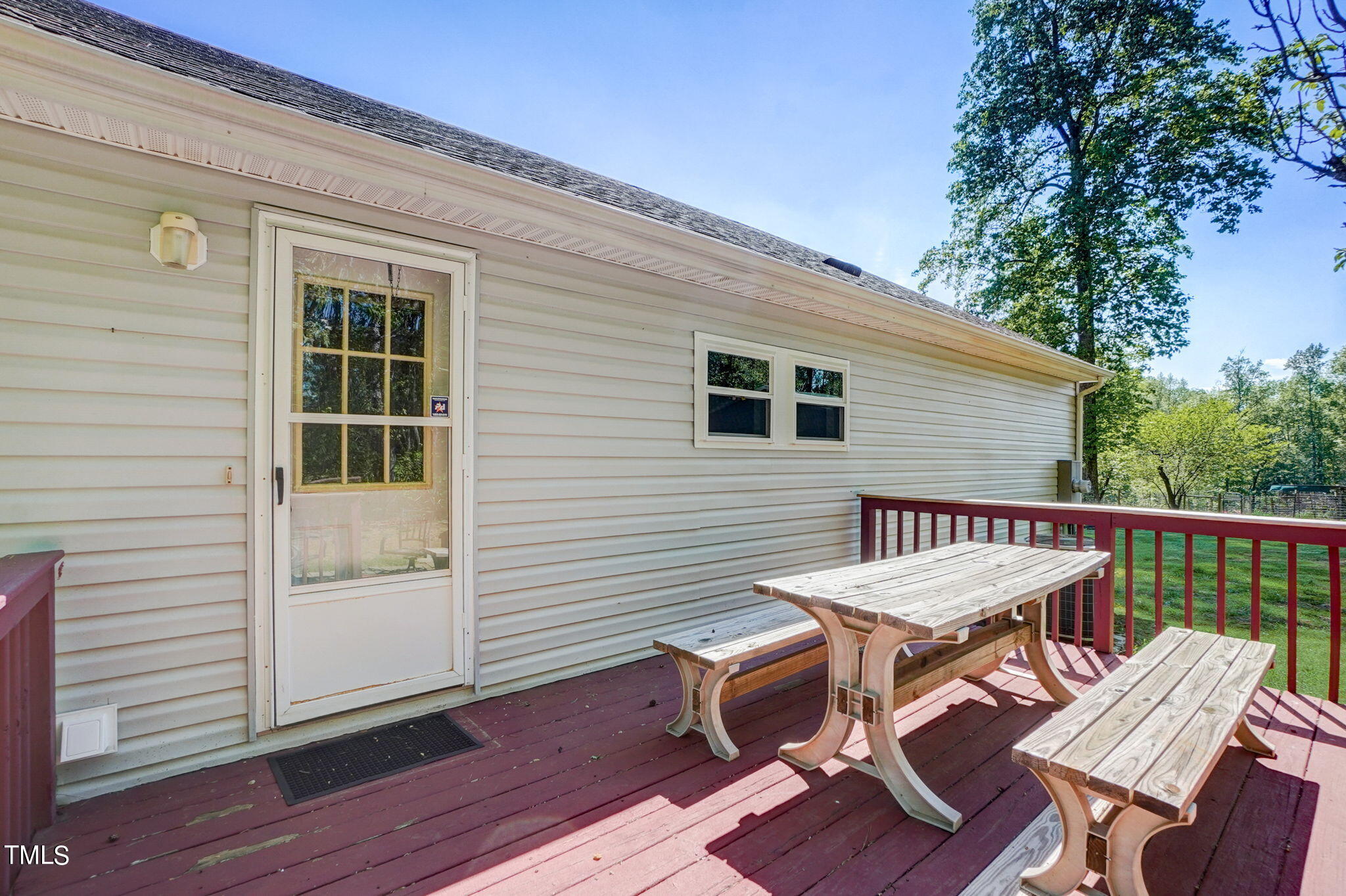 7204 New Sharon Church Road Rougemont, NC 27572 - Photo 42 of 48 a view of a dinning table and chairs in the balcony