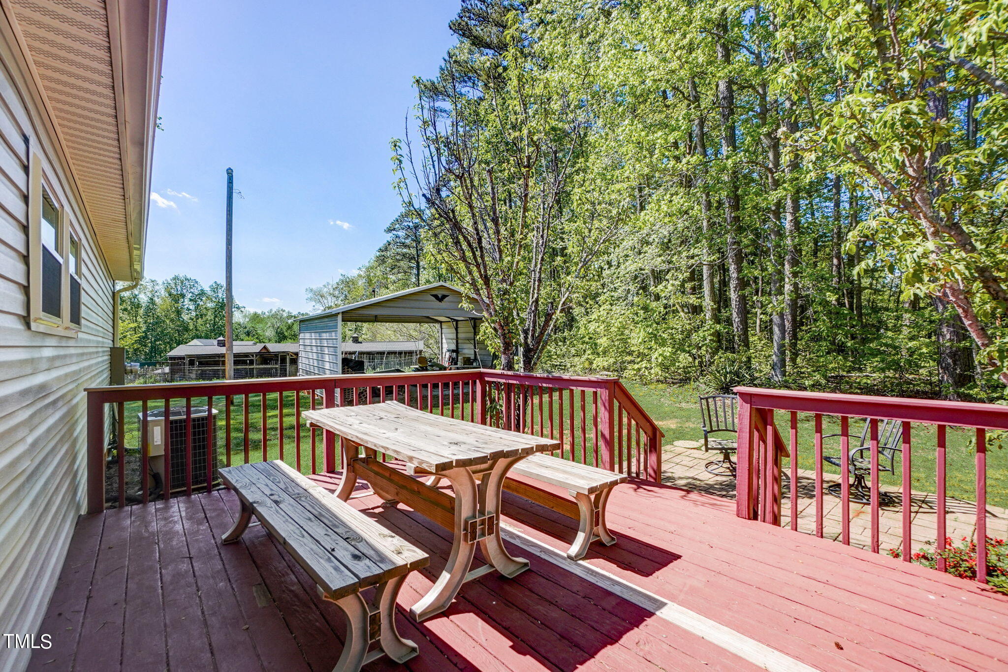 7204 New Sharon Church Road Rougemont, NC 27572 - Photo 45 of 48 a view of balcony with wooden floor and outdoor seating
