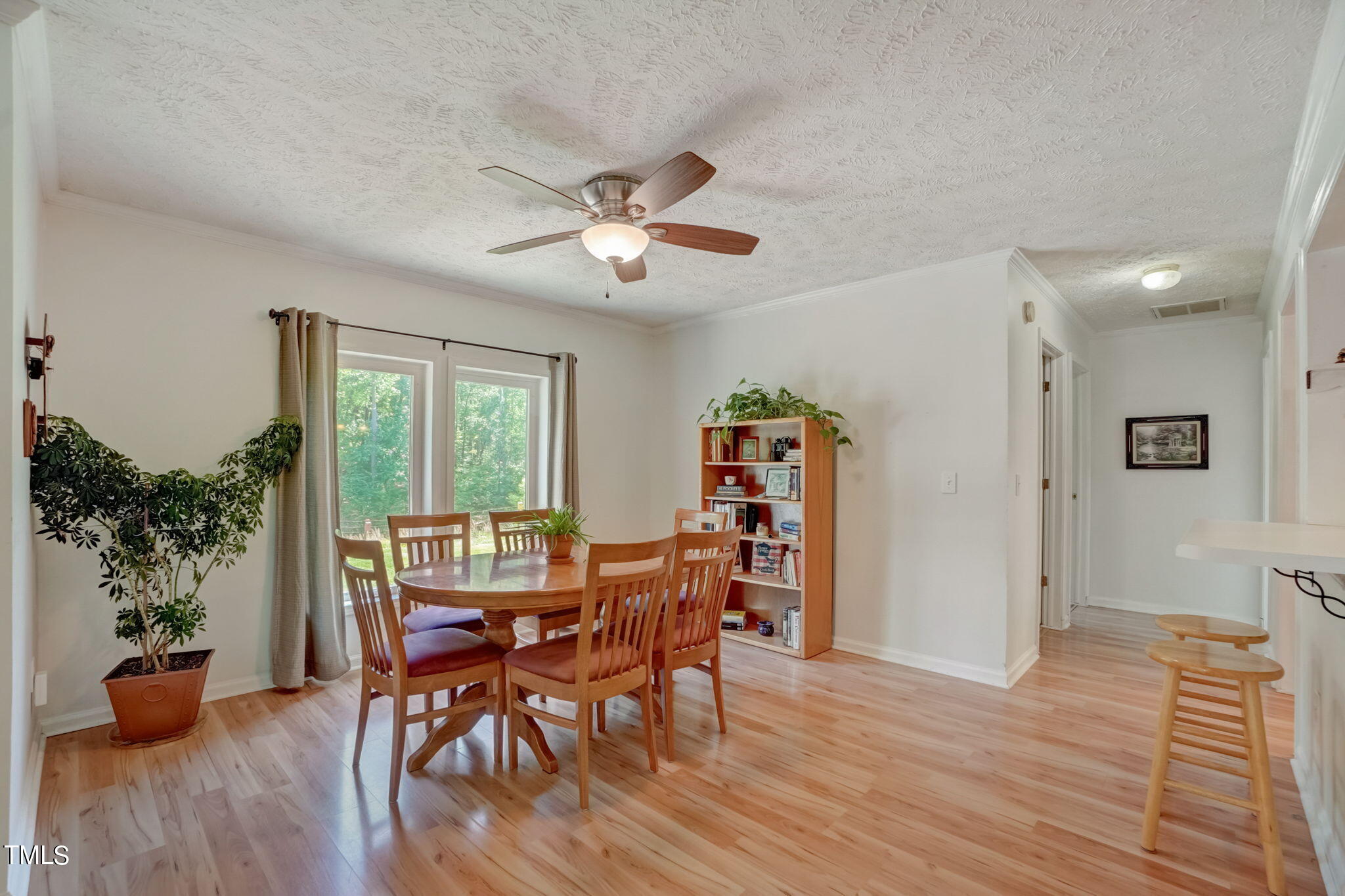 7204 New Sharon Church Road Rougemont, NC 27572 - Photo 7 of 48 a view of a dining room with furniture window and wooden floor