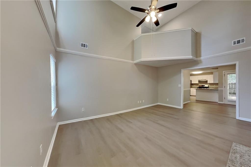 3366 English Oaks Drive Northwest Kennesaw, GA 30144 - Photo 3 of 22 wooden floor in an empty room