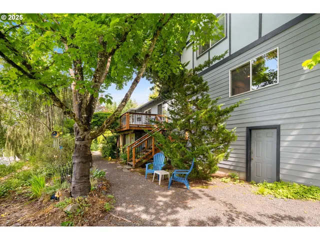 a backyard of a house with lots of green space