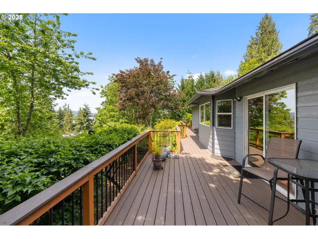 a view of balcony with furniture