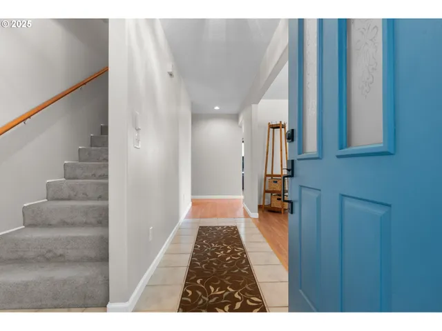 a view of hallway with stairs