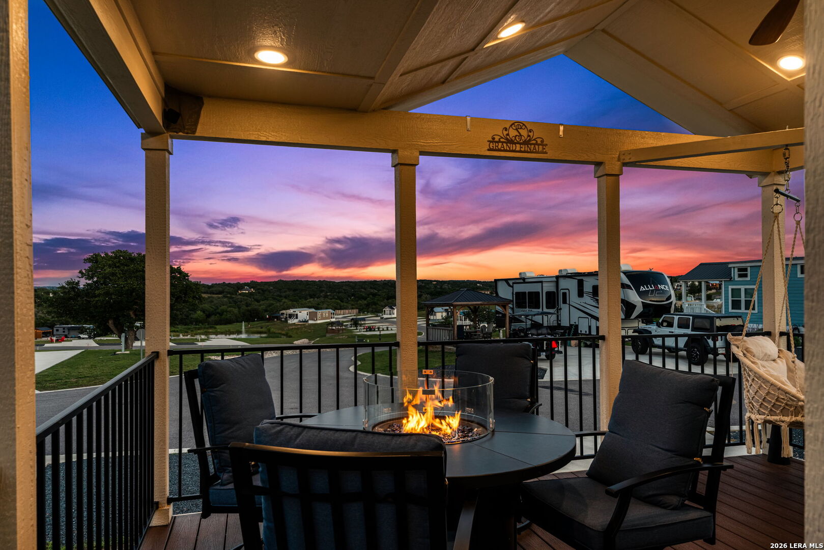 5386 Ranch Road 1376, Unit 64 Fredericksburg, TX 78624 - Photo 15 of 45 a view of a chairs and table in patio