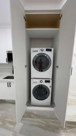 a view of backyard with a garden and entertaining space