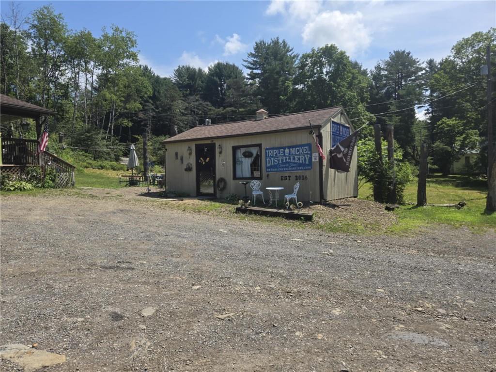 2879 Winslow Hill Road Benezett, PA 15821 - Photo 23 of 24 a view of a house with backyard