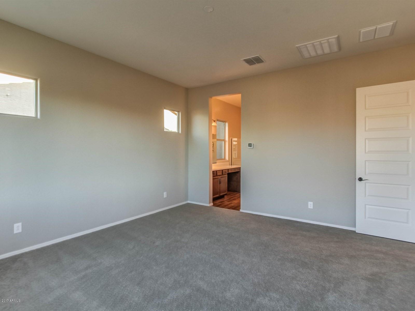 42868 West Mallard Road Maricopa, AZ 85138 - Photo 9 of 14 009_Master Suite