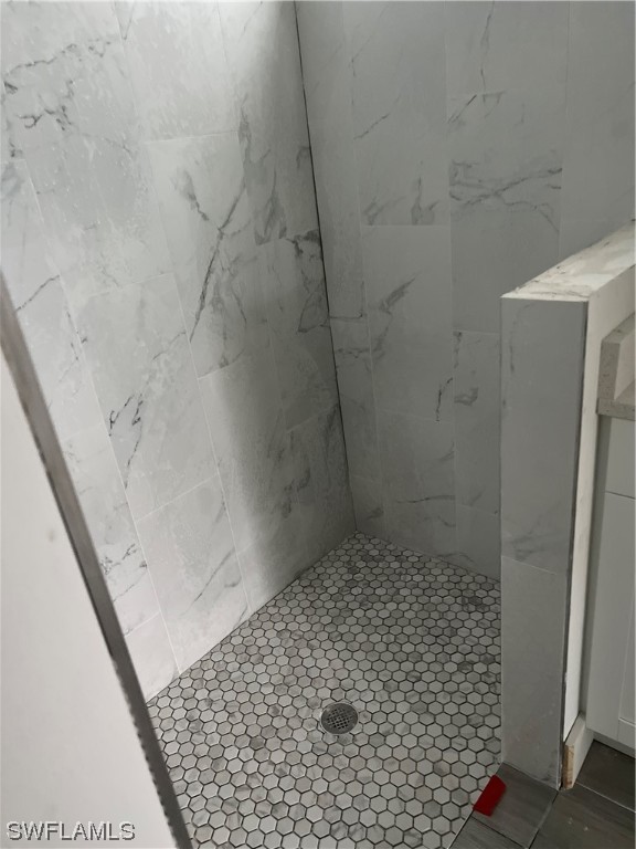 335 Ranch Avenue Lehigh Acres, FL 33974 - Photo 8 of 24 a bathroom with a shower