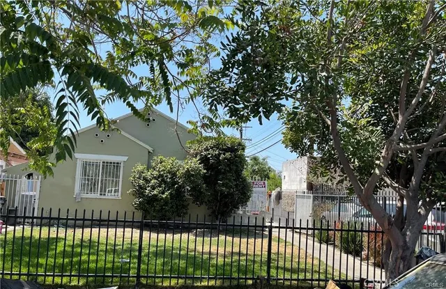 a front view of a house having yard
