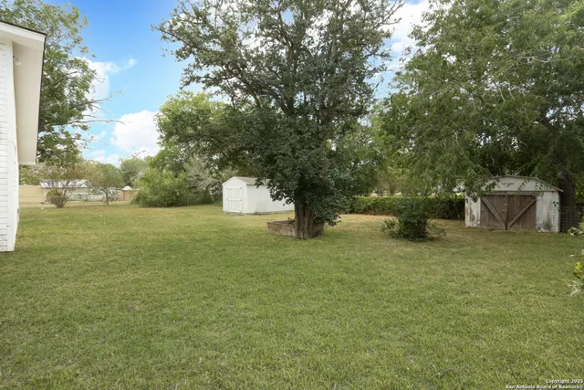 a fire hydrant in the middle of a field