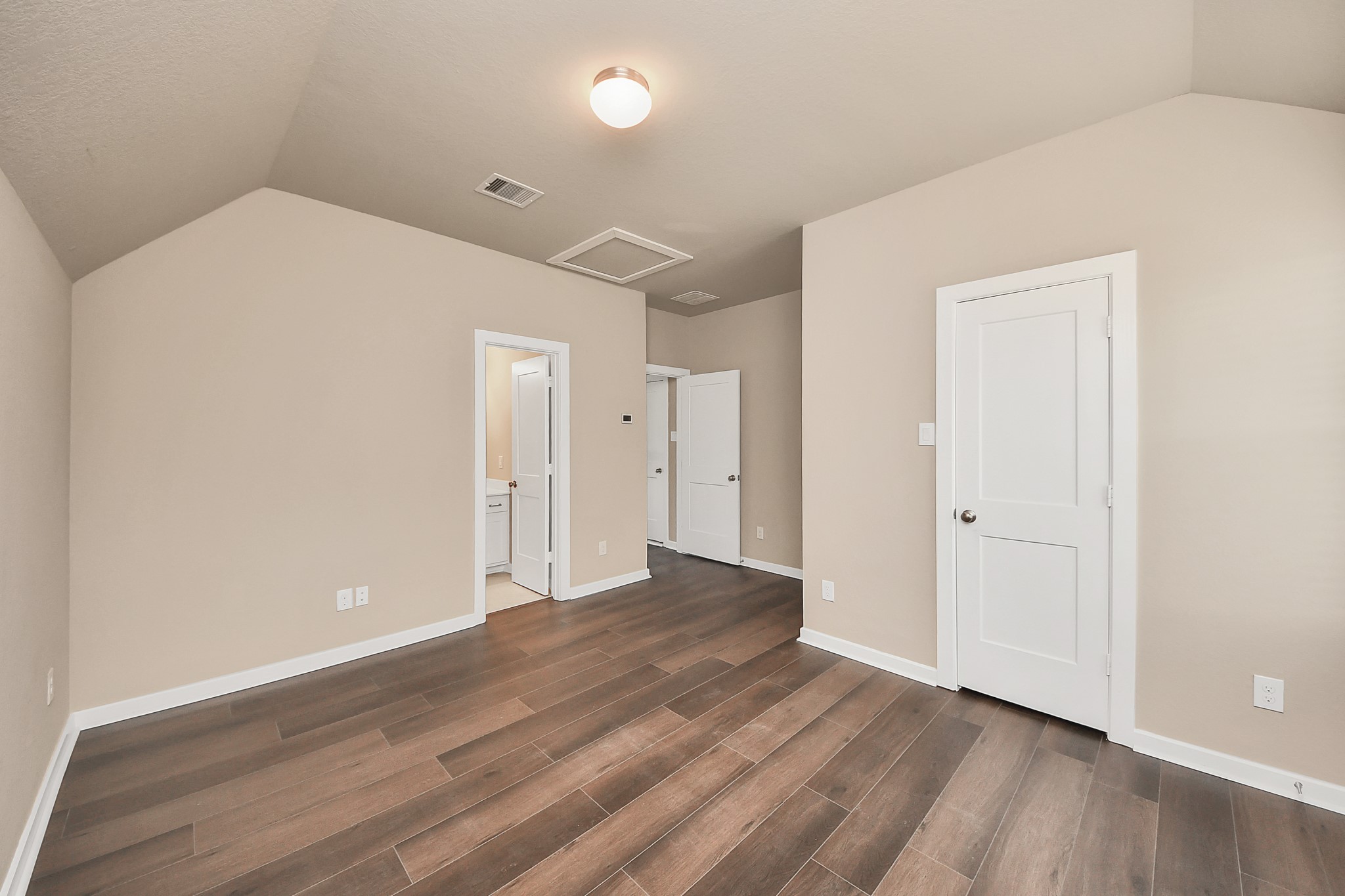 6030 Rivercane Way Katy, TX 77493 - Photo 34 of 41 a view of an empty room with wooden floor