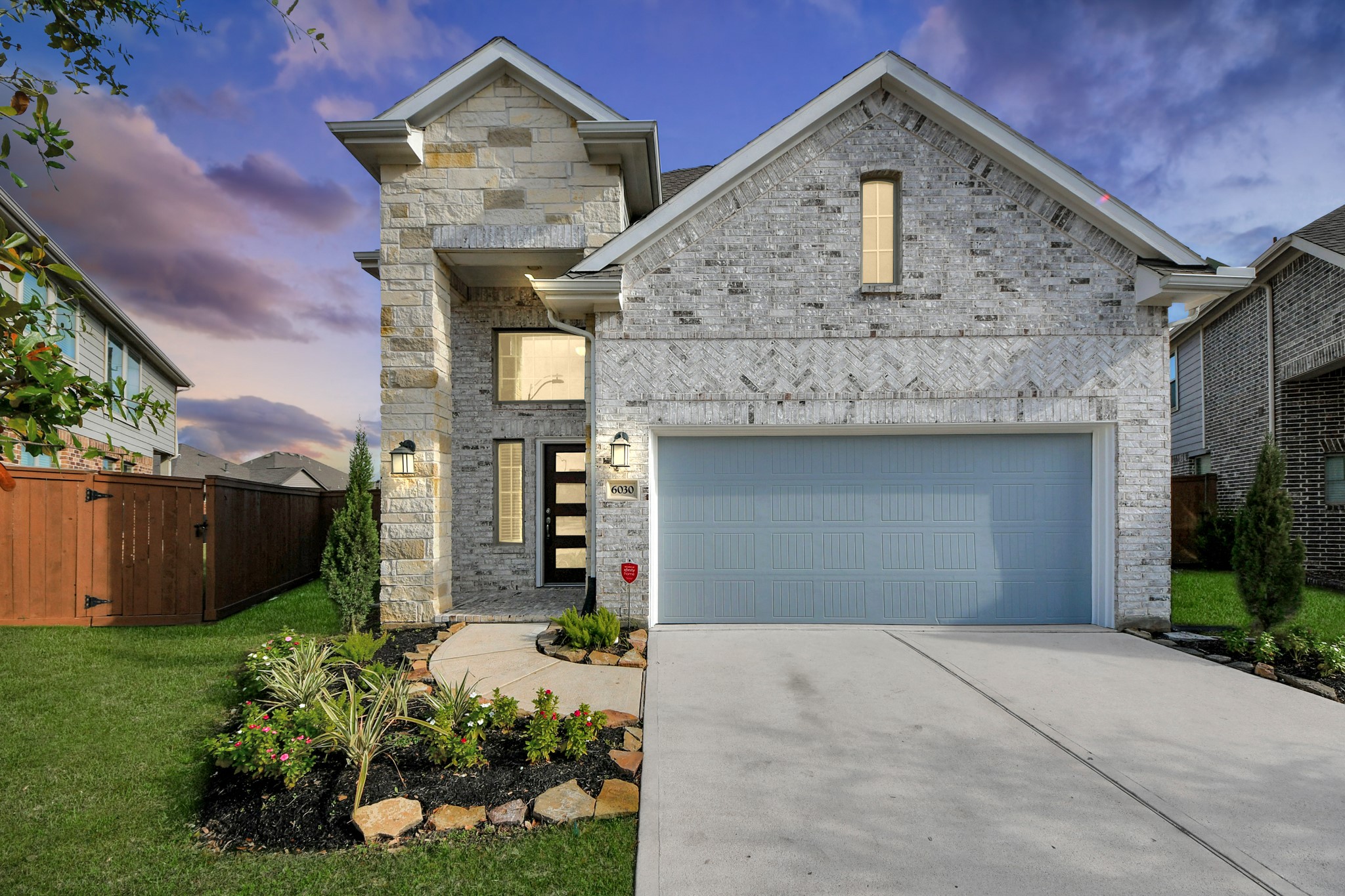 6030 Rivercane Way Katy, TX 77493 - Photo 37 of 41 a front view of a house with a yard