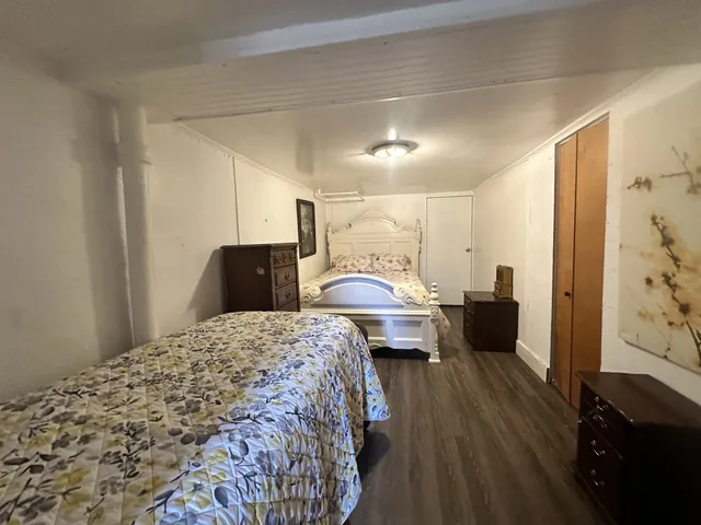 a bed room with a bed and a couch