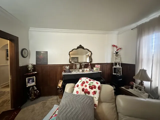 a living room with furniture and a table