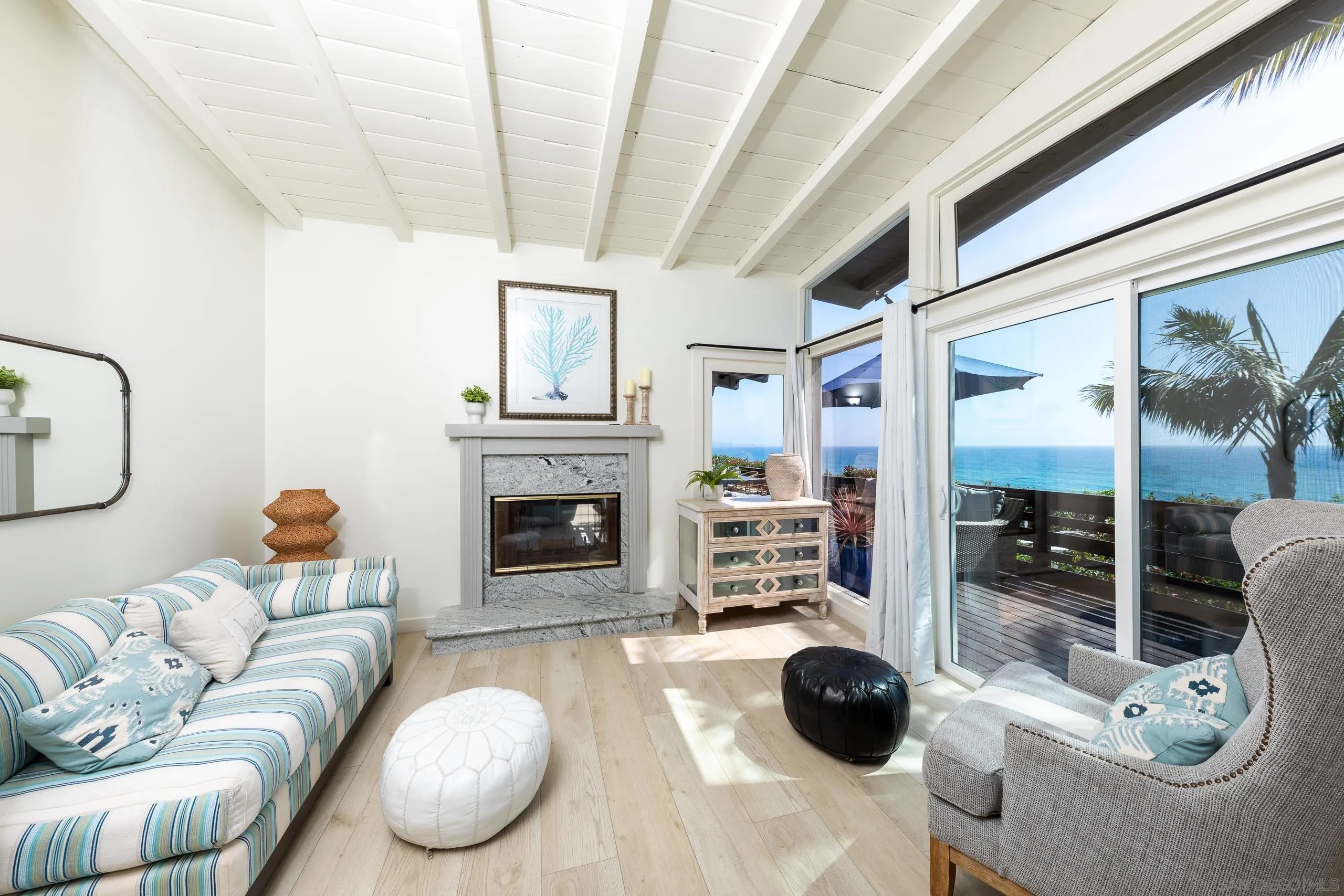 110 8th Street Del Mar, CA 92014 - Photo 18 of 45 a living room with furniture and a fireplace