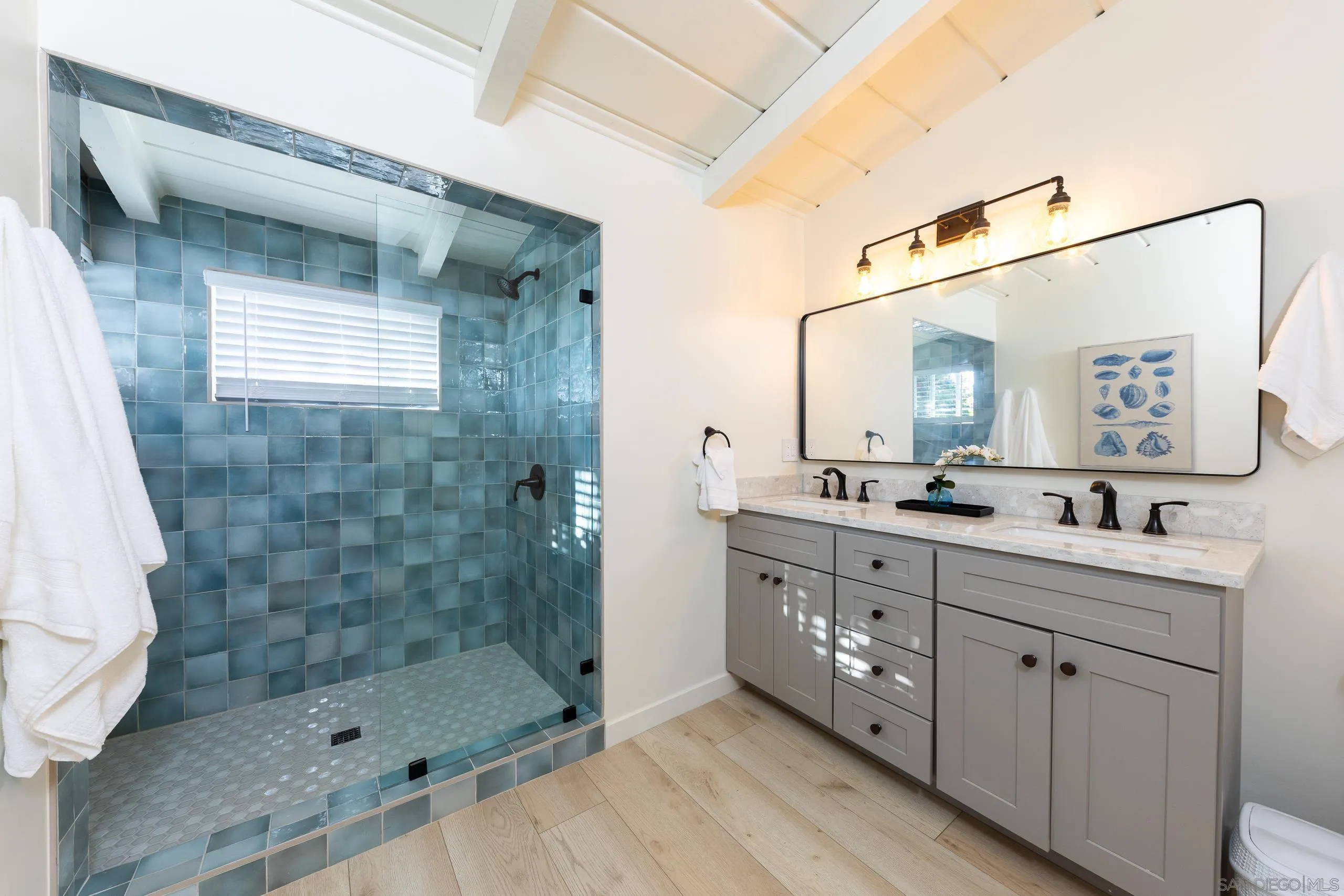 110 8th Street Del Mar, CA 92014 - Photo 20 of 45 a bathroom with a double vanity sink mirror and shower