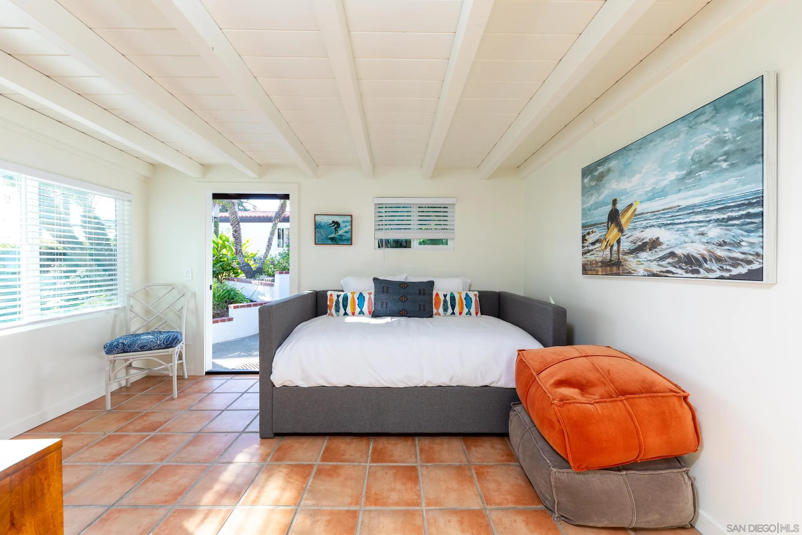 110 8th Street Del Mar, CA 92014 - Photo 23 of 45 a bed sitting in a spacious bedroom next to a window