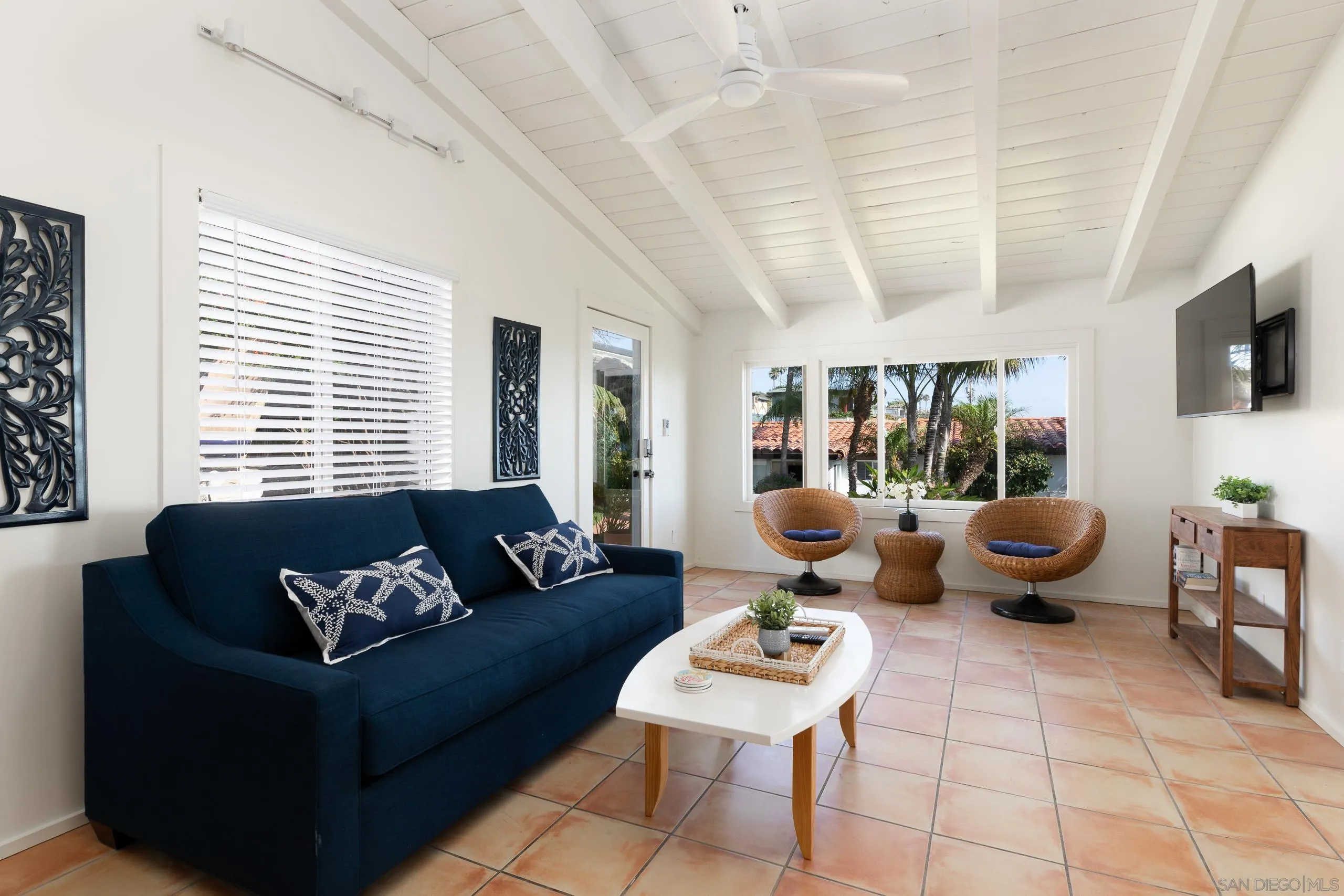 110 8th Street Del Mar, CA 92014 - Photo 28 of 45 a living room with furniture and a large window