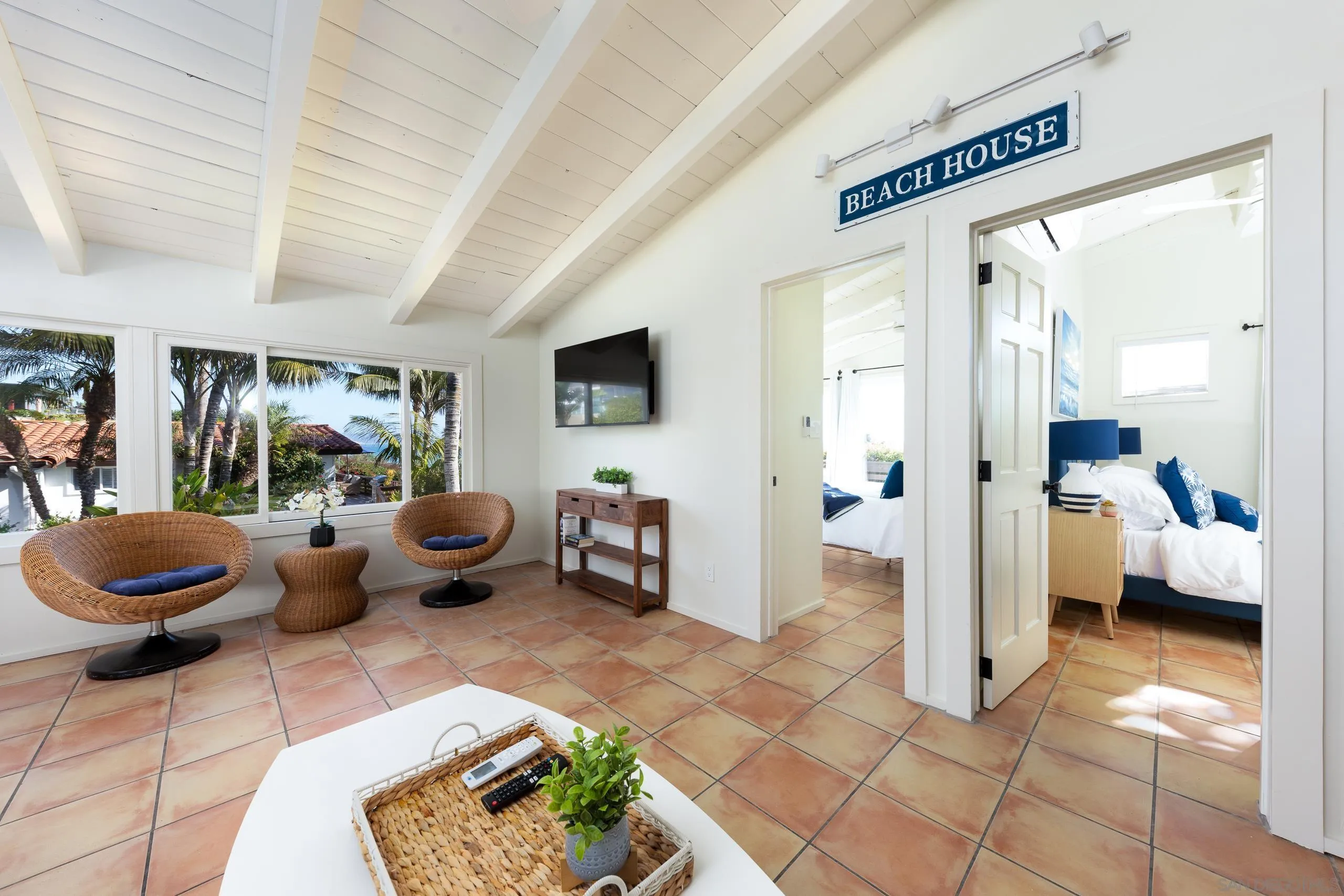 110 8th Street Del Mar, CA 92014 - Photo 29 of 45 a living room with furniture and a large window