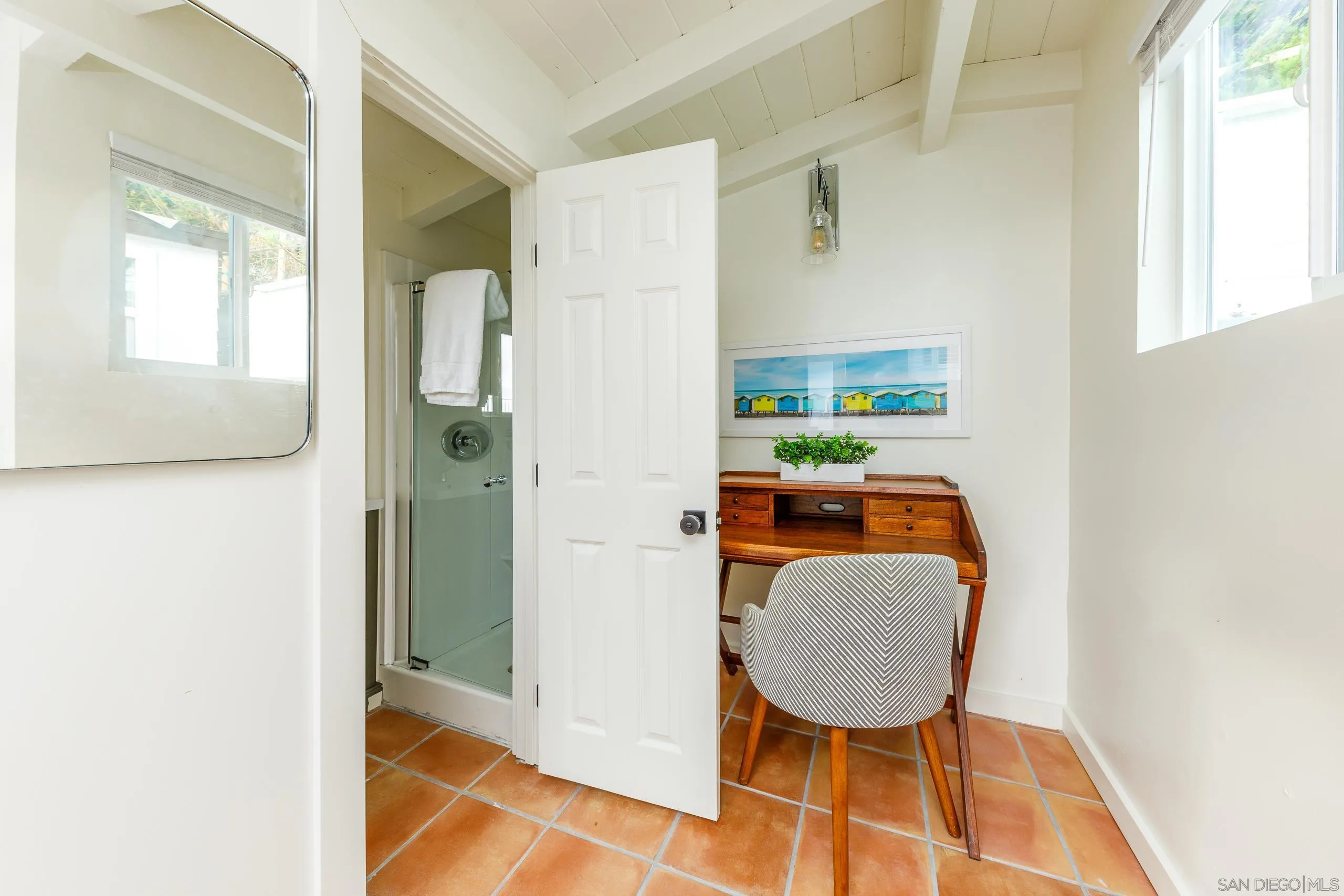 110 8th Street Del Mar, CA 92014 - Photo 38 of 45 a view of hallway with furniture and a mirror