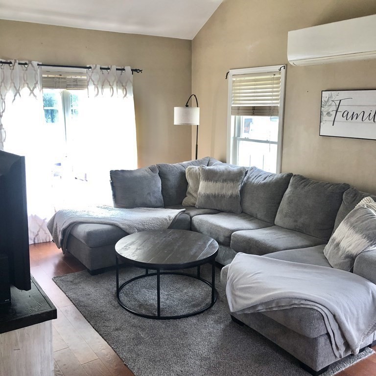 33 Bolton Road Clinton, MA 01510 - Photo 15 of 40 a living room with furniture and a large window