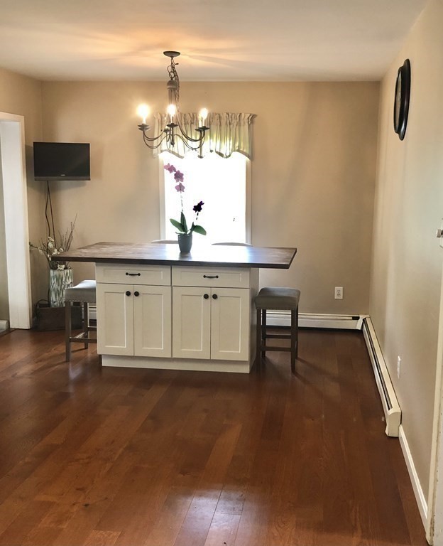 33 Bolton Road Clinton, MA 01510 - Photo 18 of 40 a view of cabinets and wooden floor