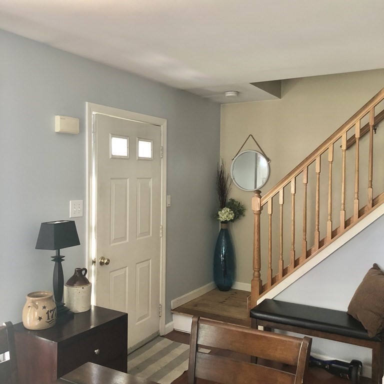 33 Bolton Road Clinton, MA 01510 - Photo 27 of 40 a living room with furniture and wooden floor