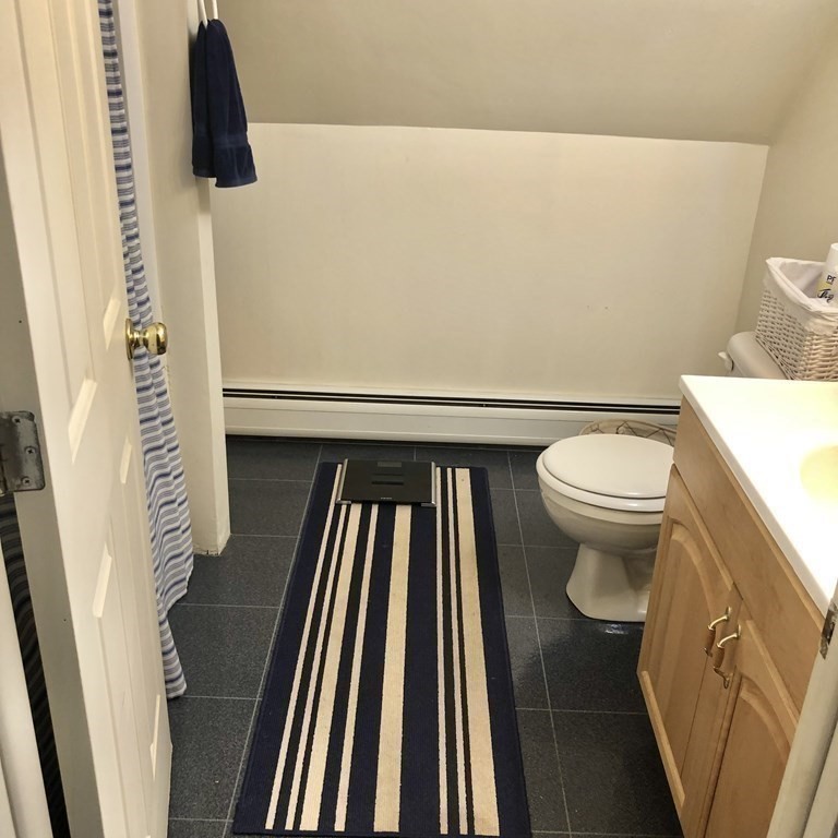 33 Bolton Road Clinton, MA 01510 - Photo 32 of 40 a bathroom with a toilet and a shower