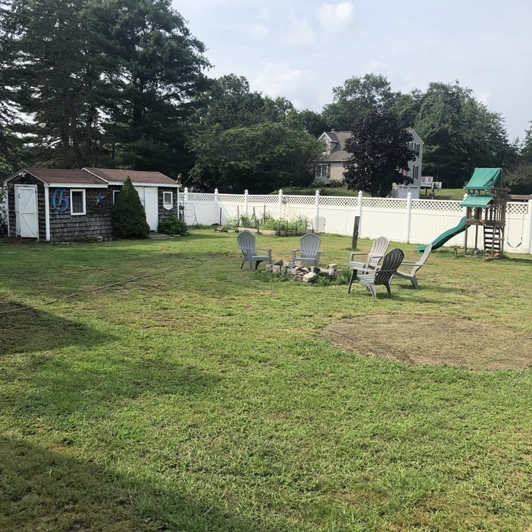 33 Bolton Road Clinton, MA 01510 - Photo 5 of 40 a view of a house with a yard