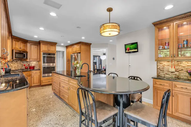 a view of dining table and chairs