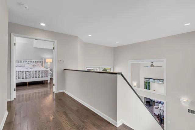 a view of a hallway with staircase
