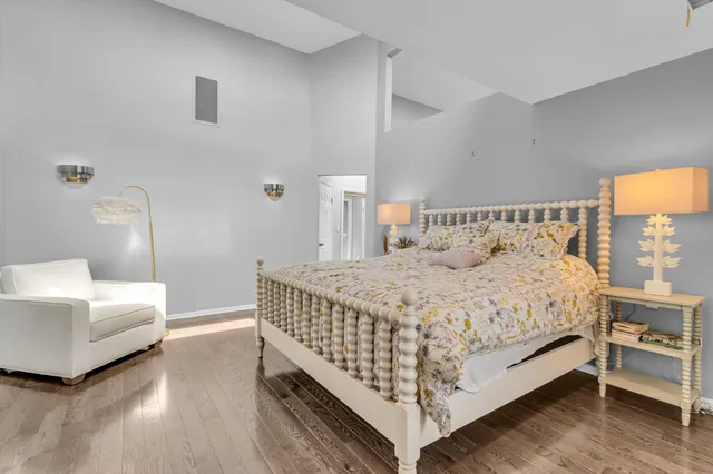 a bed room with a bed and a couch