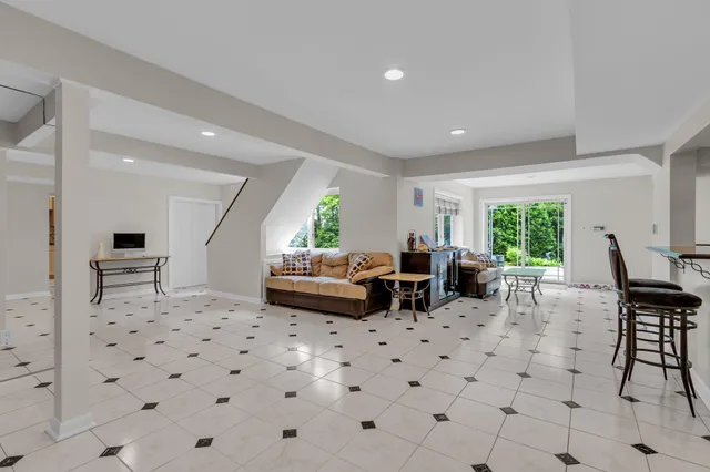 a living room with furniture and a table