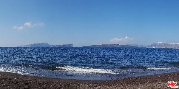 a view of mountain with wooden floor