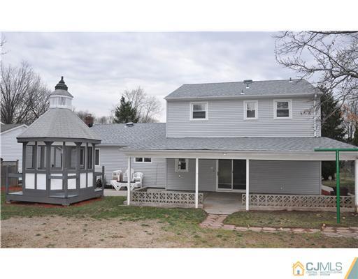 30 Warwick Road Edison, NJ 08820 - Photo 2 of 16 a house view with a garden space