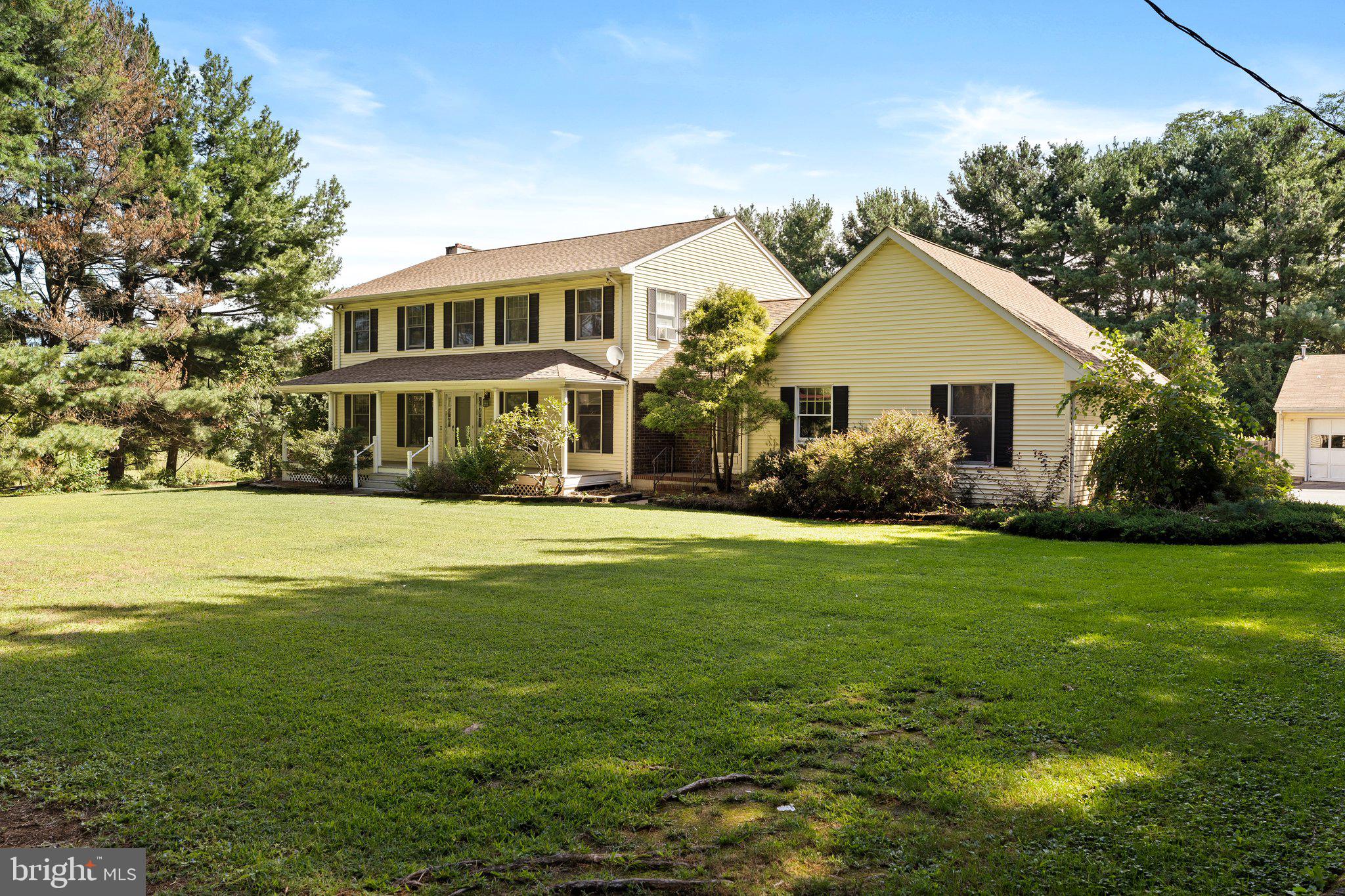 87 Bordentown Chesterfield Road Chesterfield, NJ 08515 - Photo 2 of 49 a front view of house with yard and green space