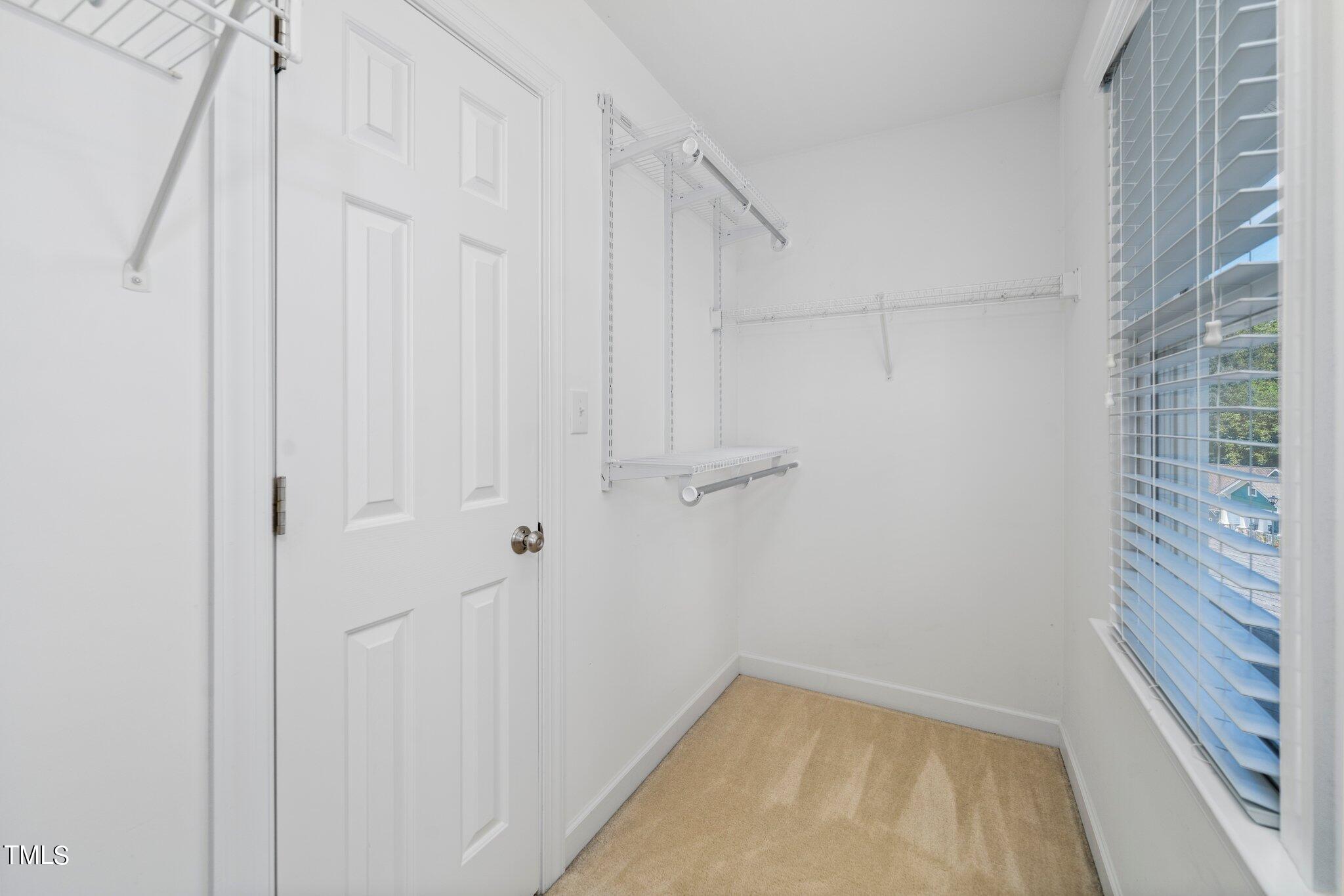 222 Homegate Circle Apex, NC 27502 - Photo 18 of 33 a view of small space with wooden floor