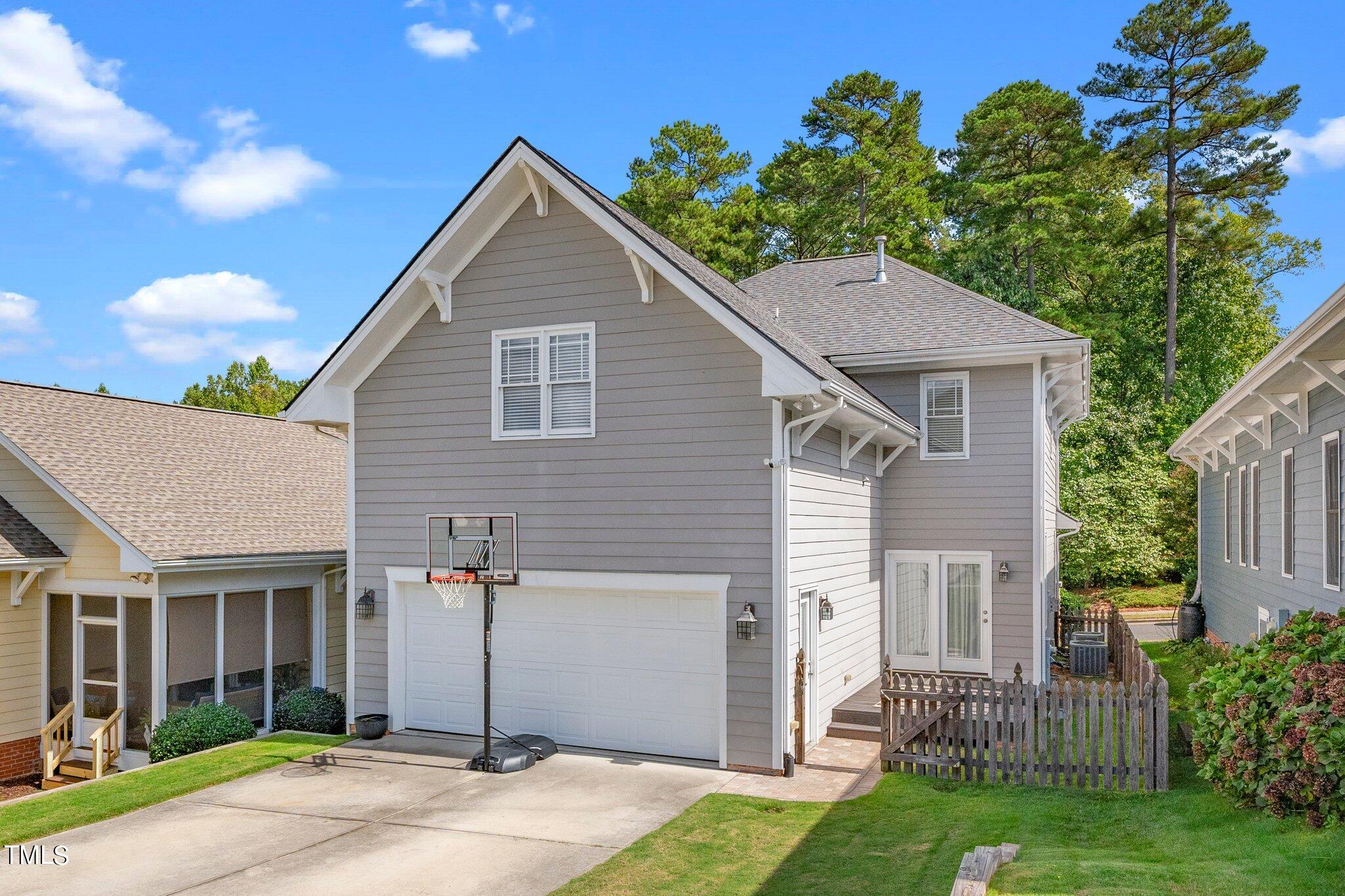 222 Homegate Circle Apex, NC 27502 - Photo 27 of 33 a view of a house with a yard