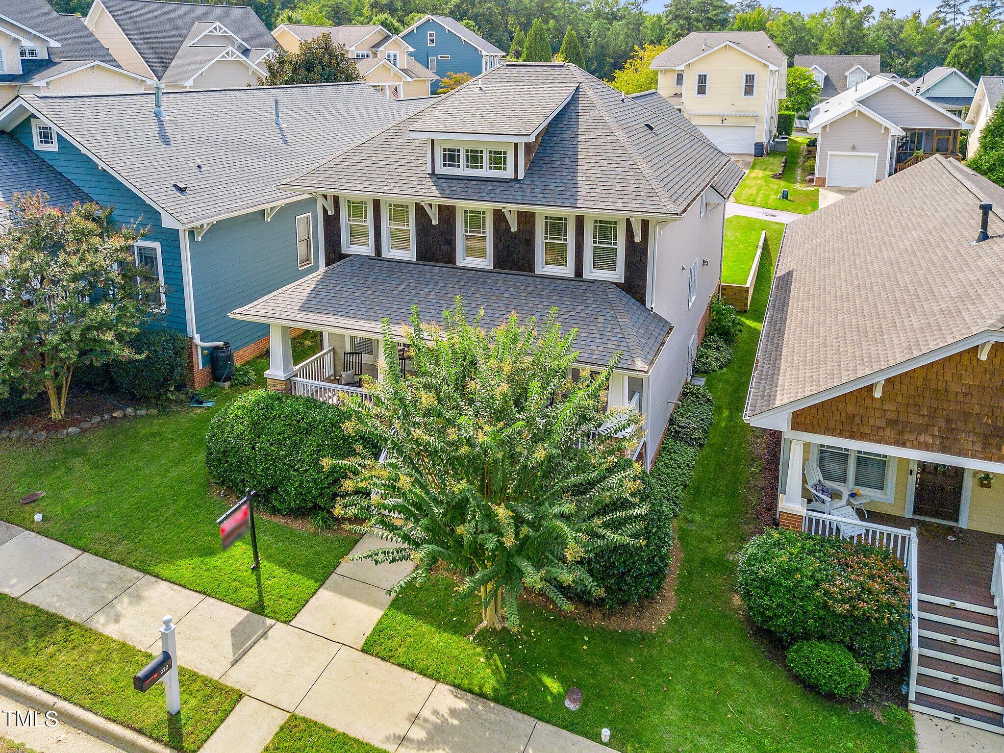 222 Homegate Circle Apex, NC 27502 - Photo 29 of 33 a aerial view of a brick house next to a yard