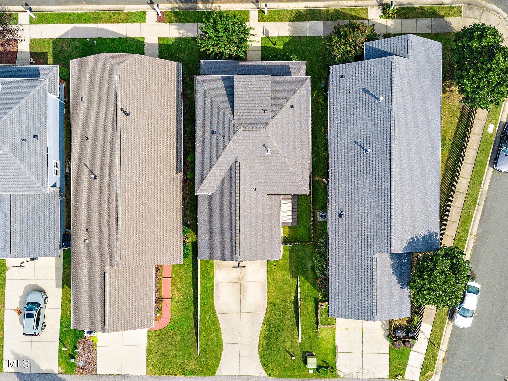 222 Homegate Circle Apex, NC 27502 - Photo 31 of 33 an aerial view of a house with a swimming pool