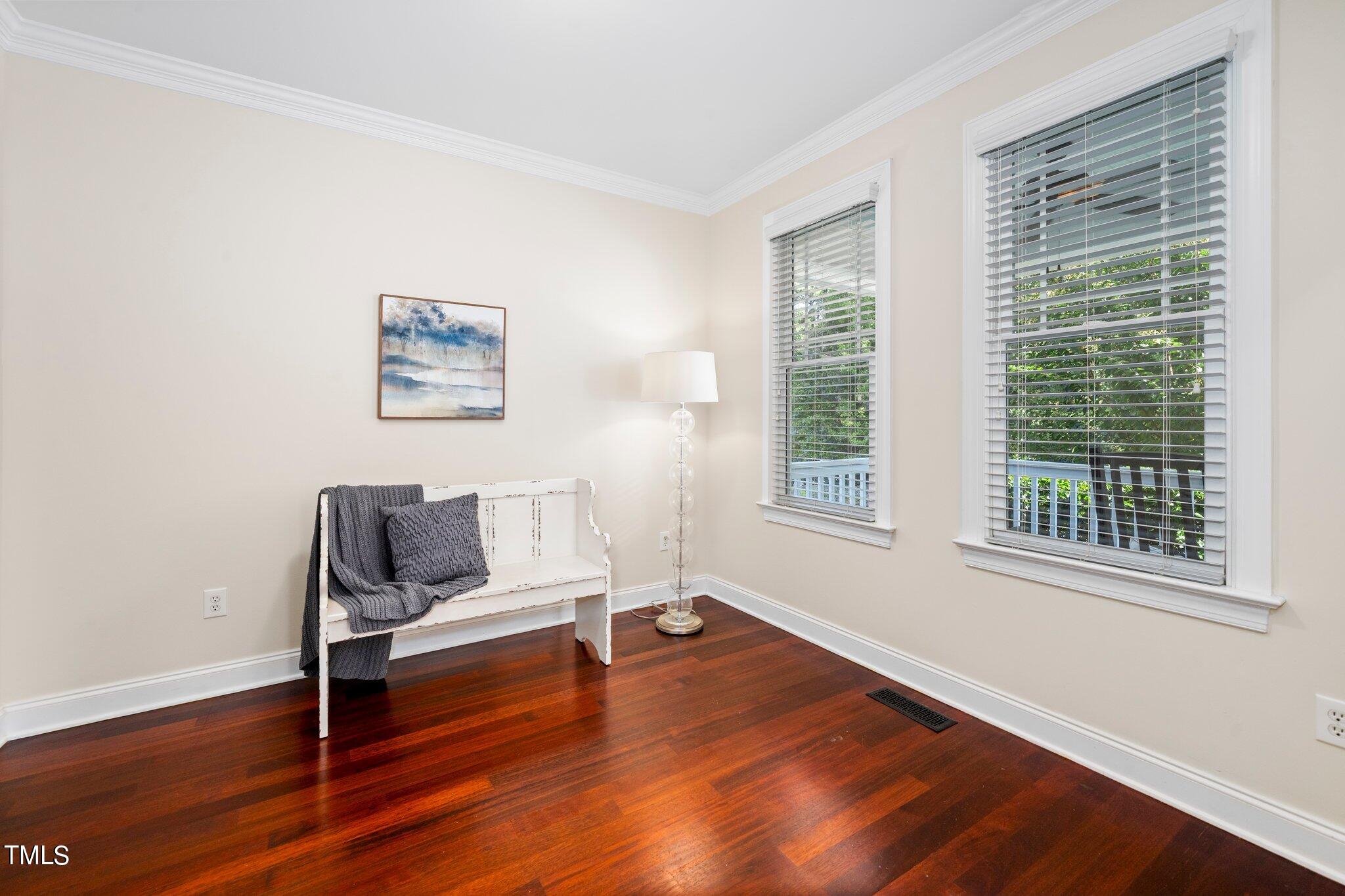 222 Homegate Circle Apex, NC 27502 - Photo 9 of 33 a living room with furniture and a window