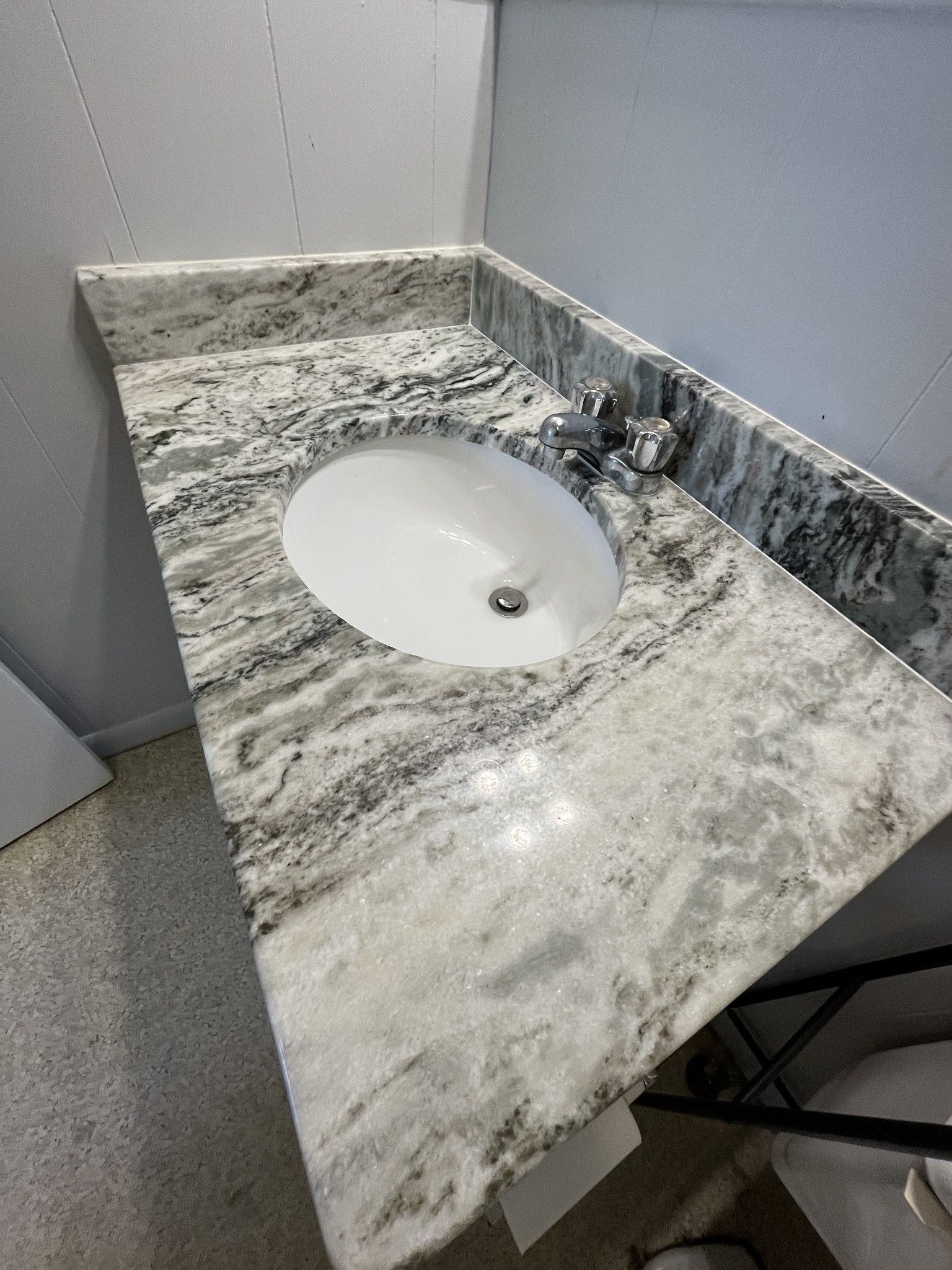 437 East Jefferson Street Pulaski, TN 38478 - Photo 10 of 11 a bathroom with a sink and a mirror