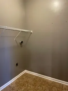 a view of a room with rack on the wall