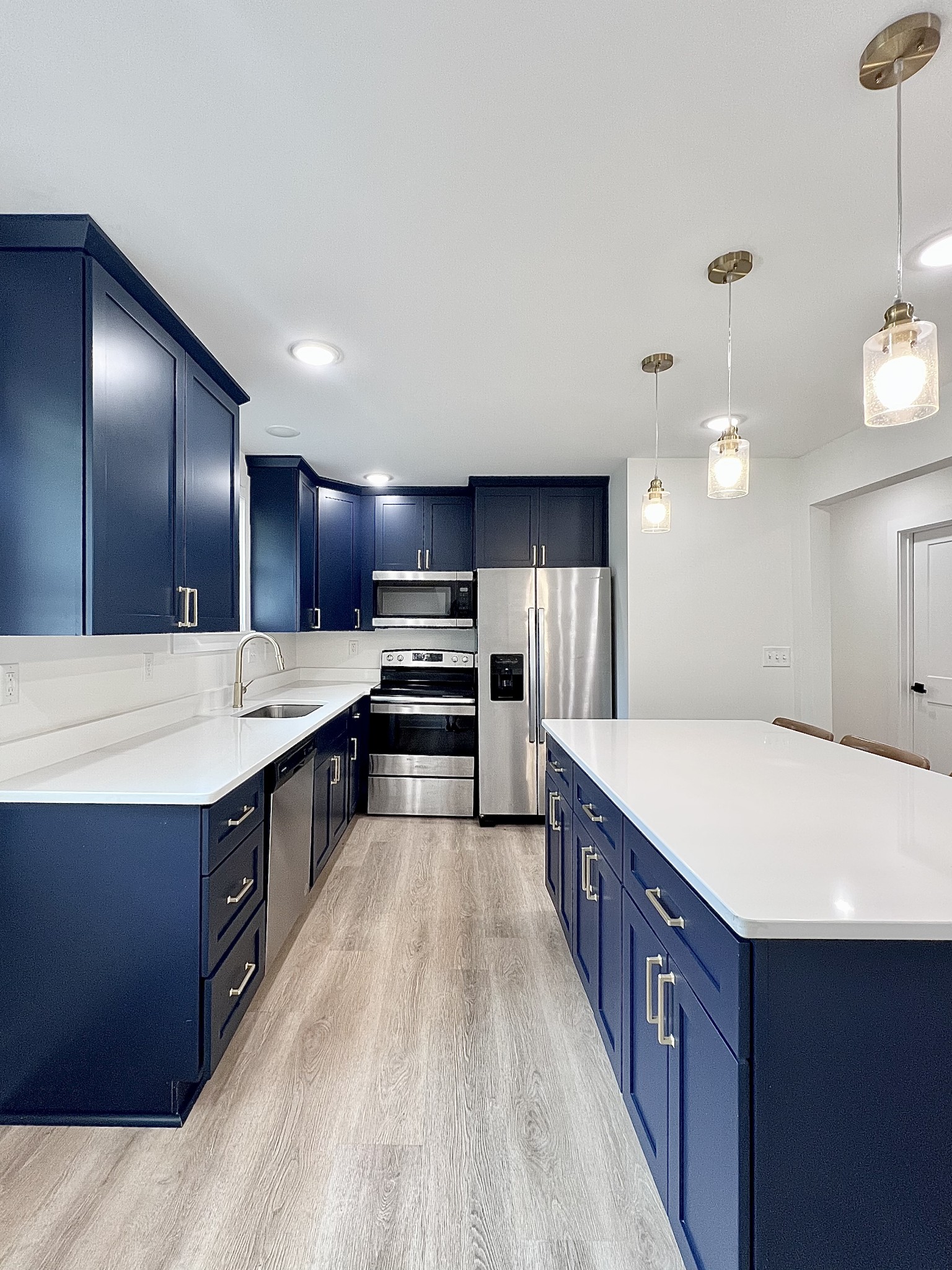 207 North Cedar Lane Pulaski, TN 38478 - Photo 11 of 66 a large kitchen with stainless steel appliances a large counter top