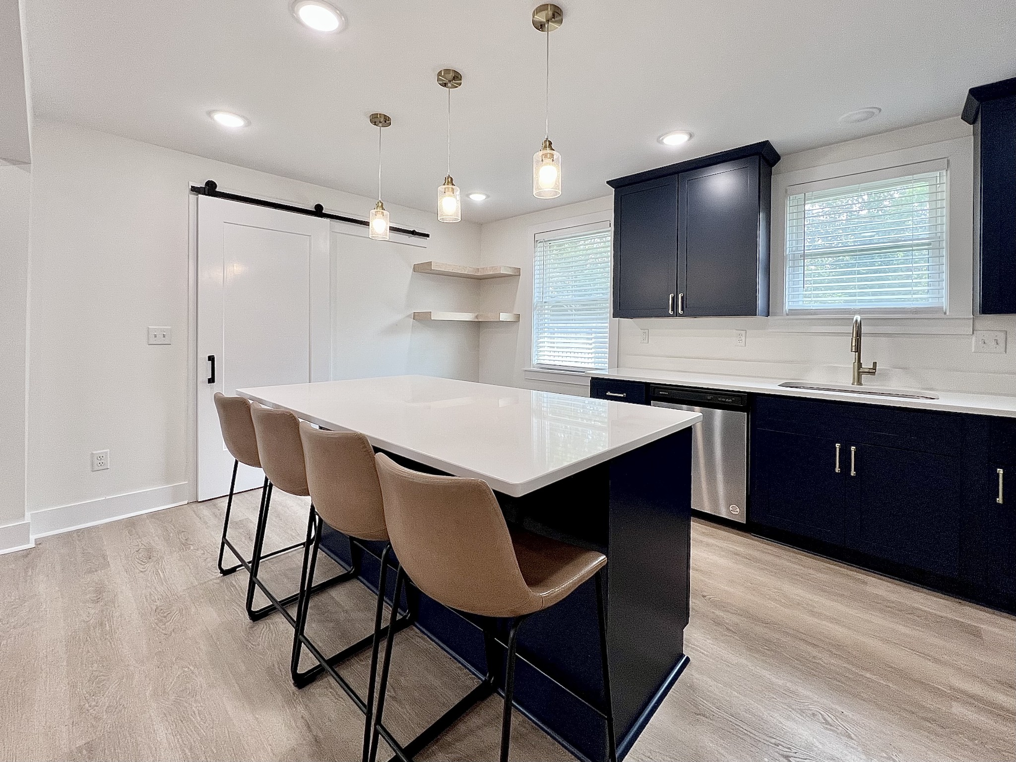 207 North Cedar Lane Pulaski, TN 38478 - Photo 15 of 66 a kitchen with a table chairs sink and cabinets