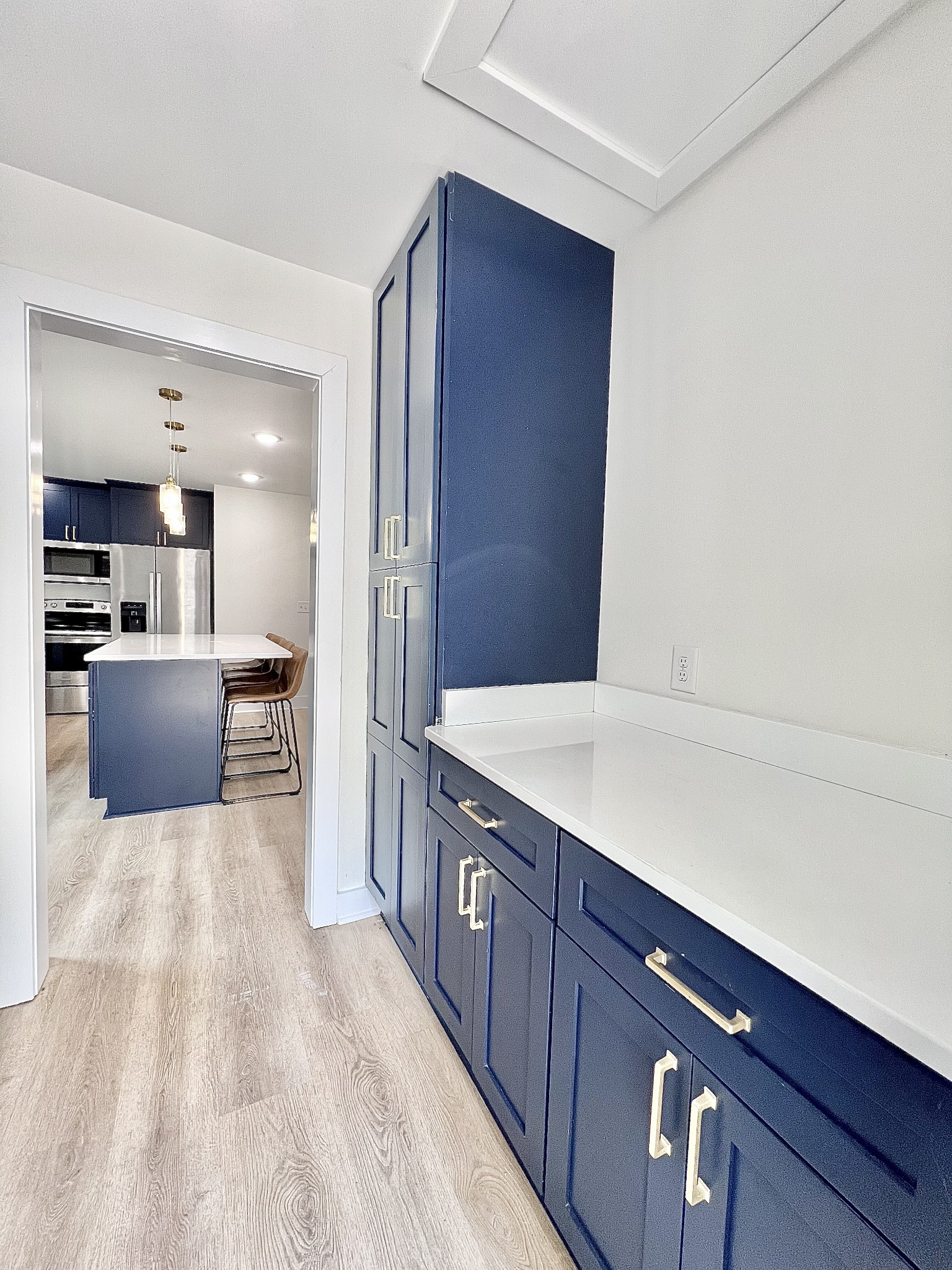 207 North Cedar Lane Pulaski, TN 38478 - Photo 26 of 66 a kitchen with stainless steel appliances kitchen island wooden cabinets and granite counter tops